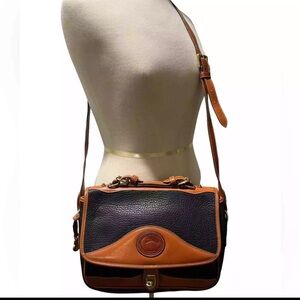Vintage Dooney & Bourke Carrier
Shoulder Bag Duck all weather EUC